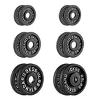 Set of black weight plates with labeled weights on a white background