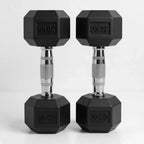 Pair of black hexagonal dumbbells with '20 KG' marking on a white background