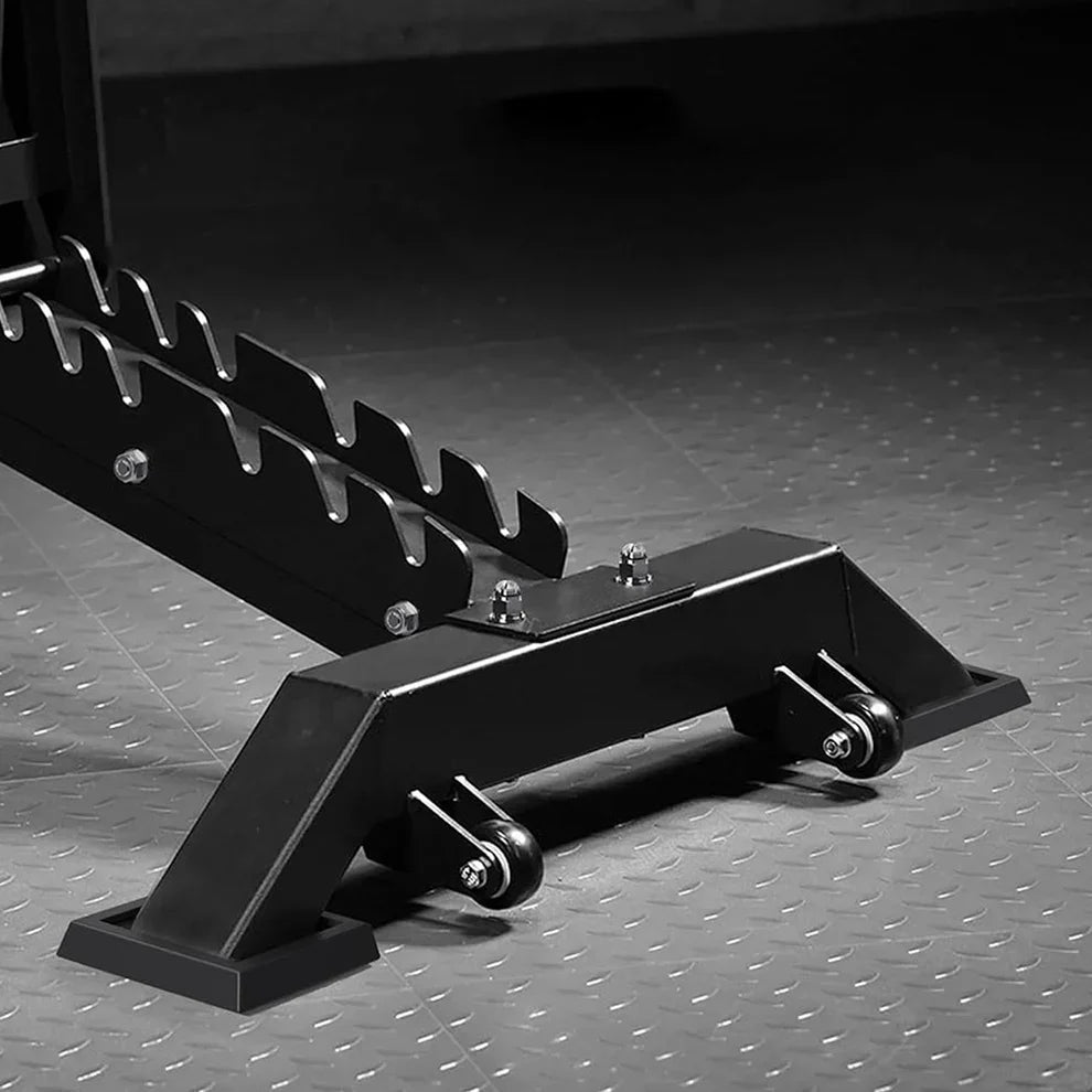 Black metal car jack on a textured gray surface