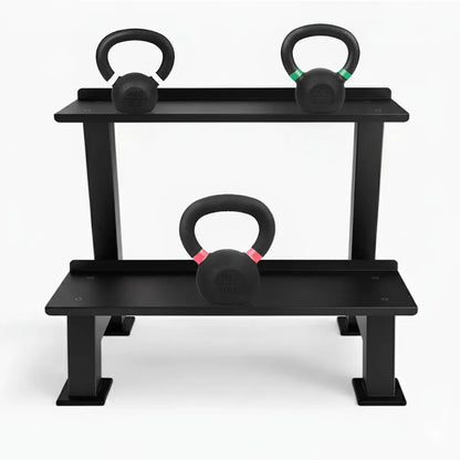 Black weight rack with three kettlebells on a white background